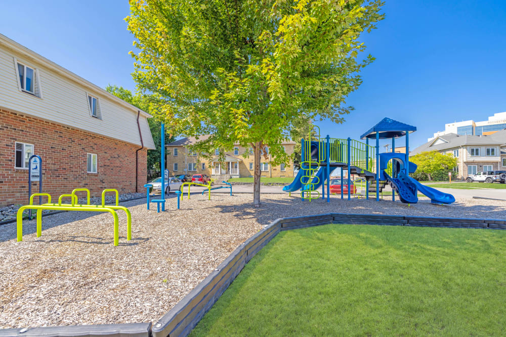 Playground and outdoor fitness stations at Parkway Manor Apartments in Irondequoit, New York