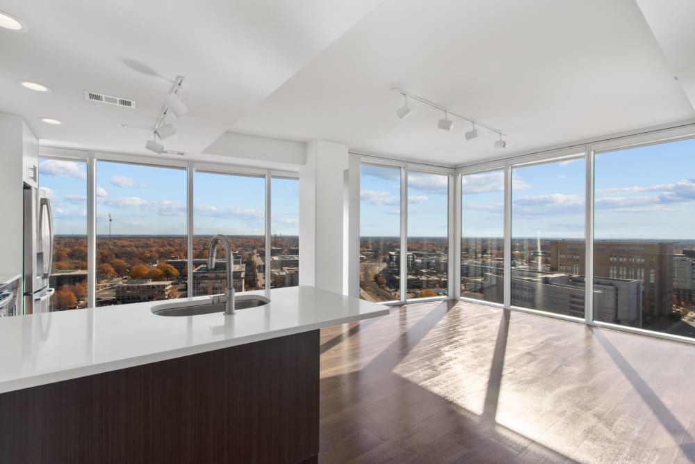 Modern high-rise apartment with floor to ceiling windows at One City Center in Durham, NC