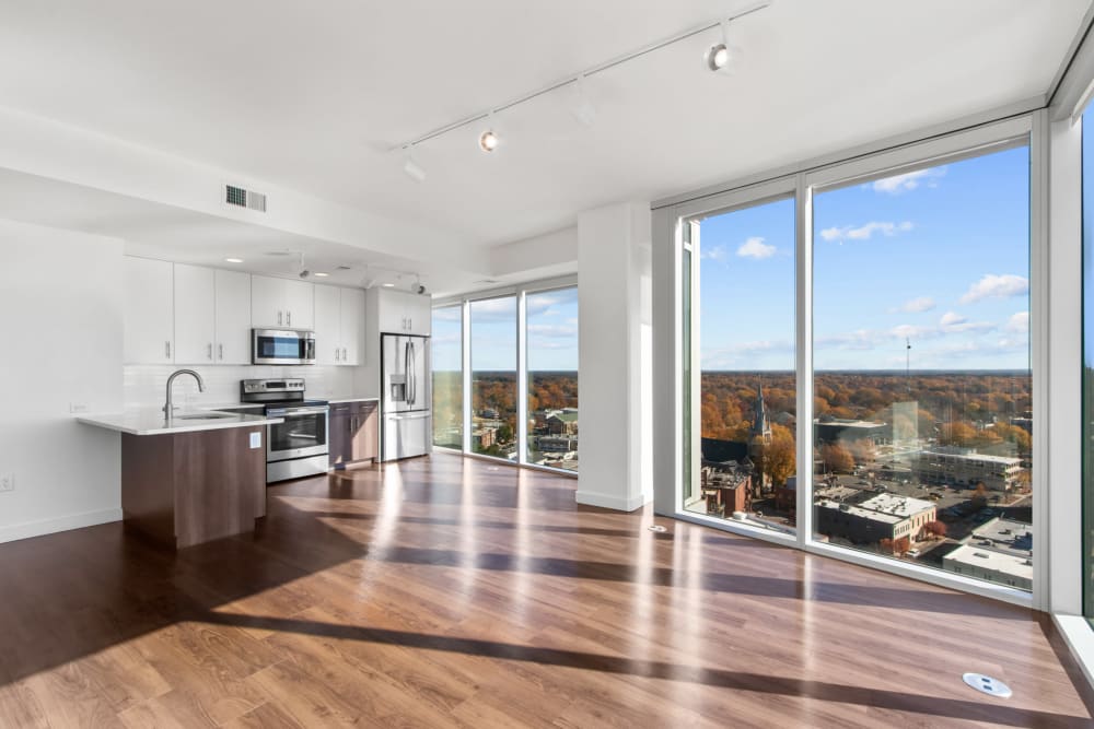 Modern high-rise apartment with floor to ceiling windows at One City Center in Durham, North Carolina
