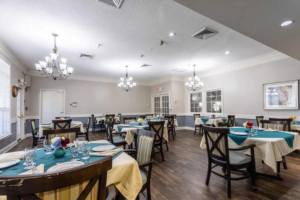 Set dining tables in the dining room at Concord Place in Concord, North Carolina
