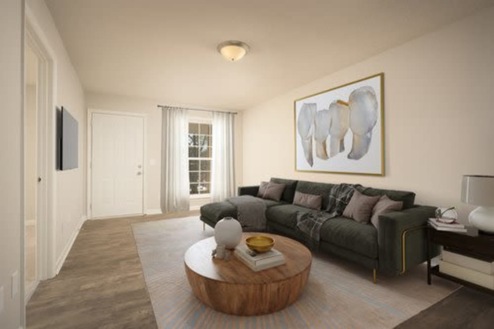 A furnished apartment living room with wood flooring at Ivy Terrace in Chattanooga, Tennessee
