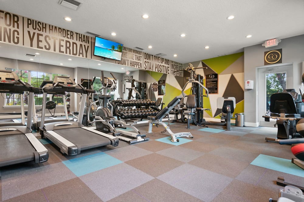 Fitness center with equipment at The Groves in Port Orange, Florida