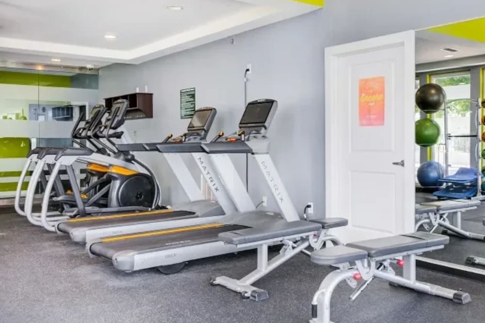 Community gym with cardio equipment at The Landing at St. Louis in Saint Louis, Missouri