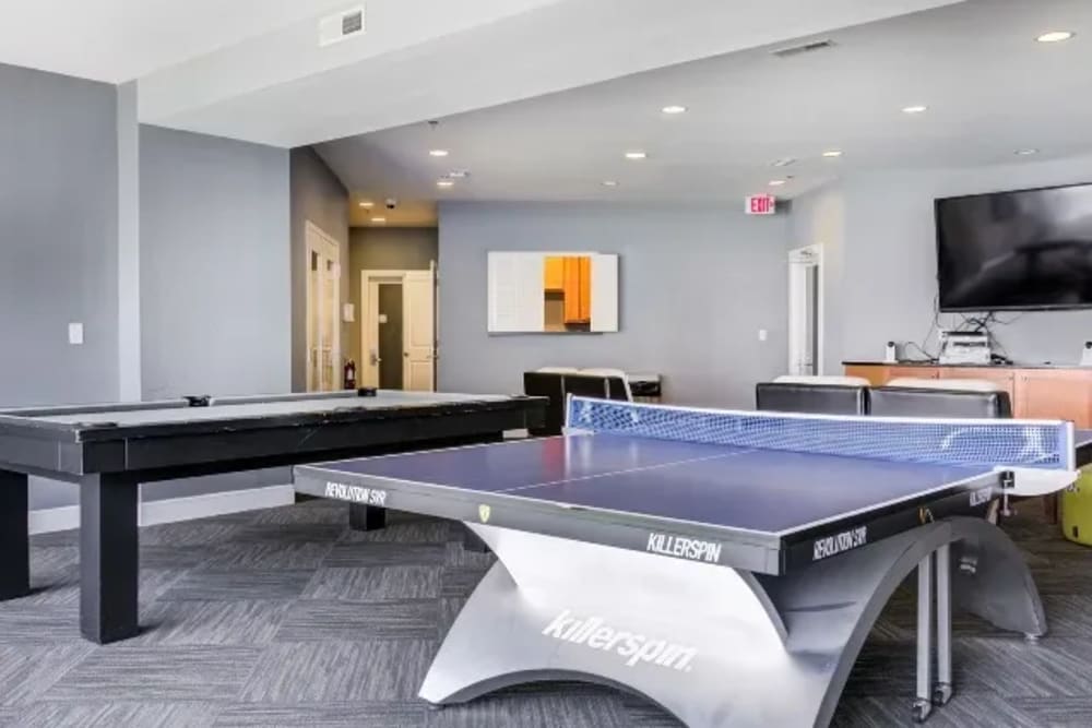 Game room with ping pong table at The Landing at St. Louis in Saint Louis, Missouri
