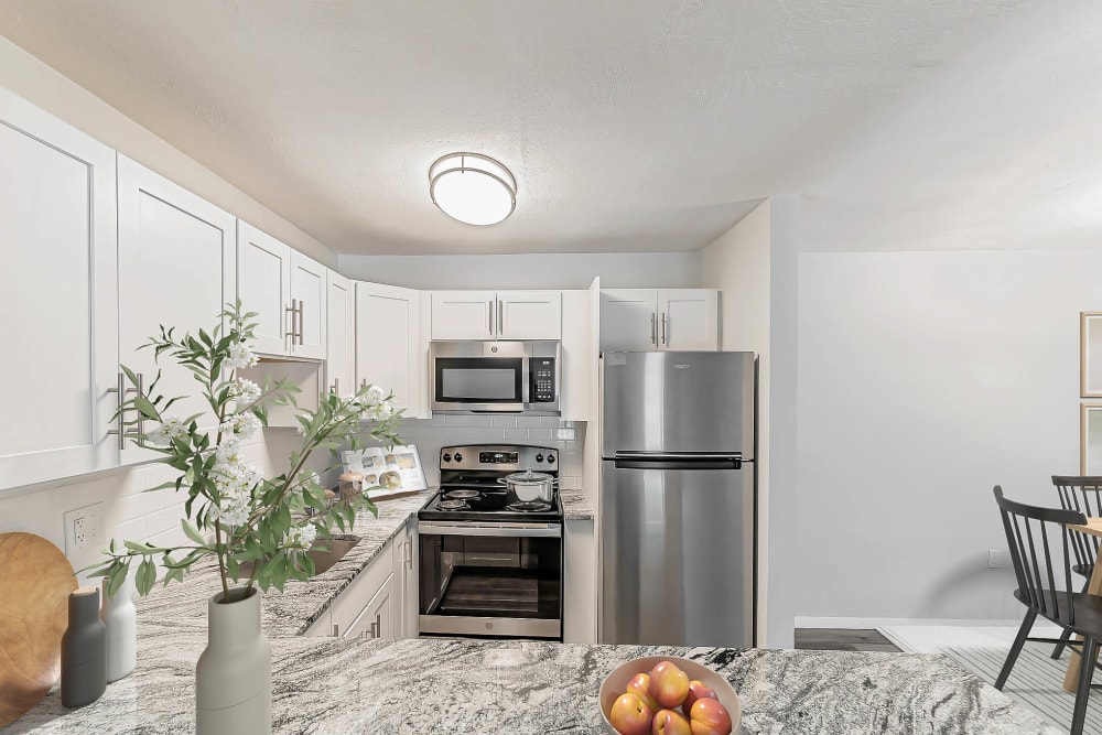Refrigerator and other kitchen appliances at our Newly Updated Apartments at Westborough