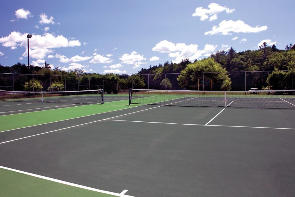 Play at our Tennis Court at Bay Ridge at Nashua Apartments in Nashua, New Hampshire