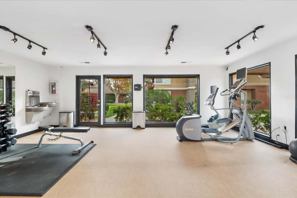 Fitness center with exercise machines at Mirabella Apartments in Bermuda Dunes, California