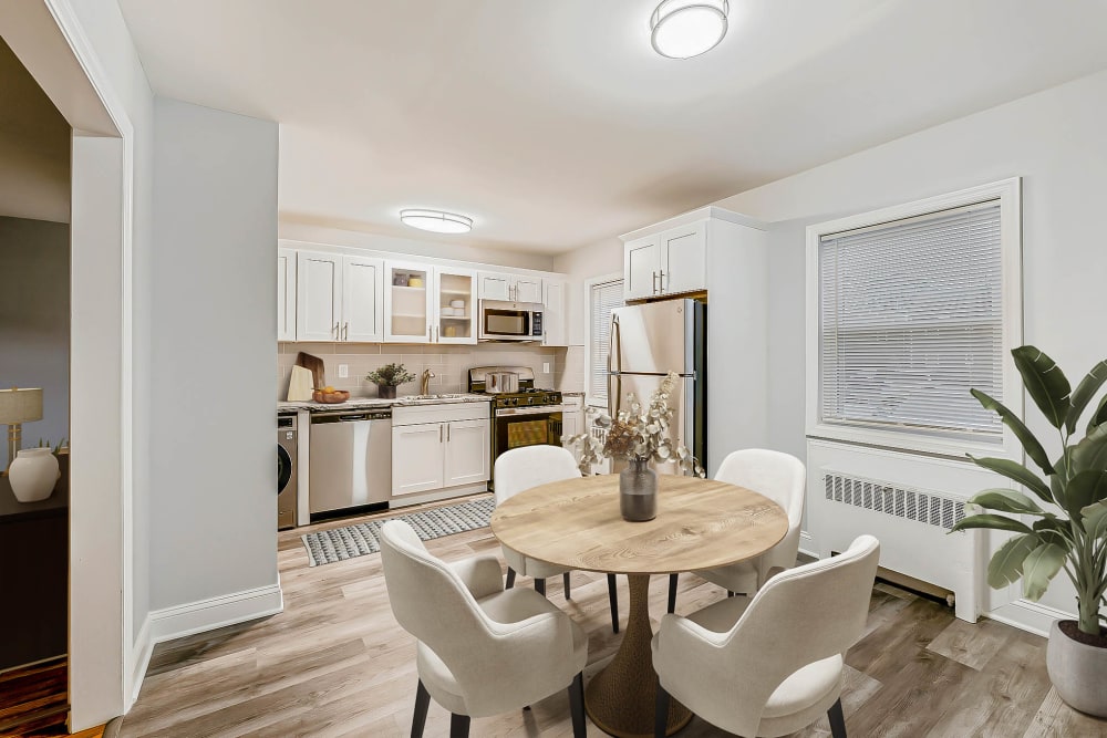 Dining area overlooking kitchen area at Eagle Rock Apartments at Huntington Station in Huntington Station, New York