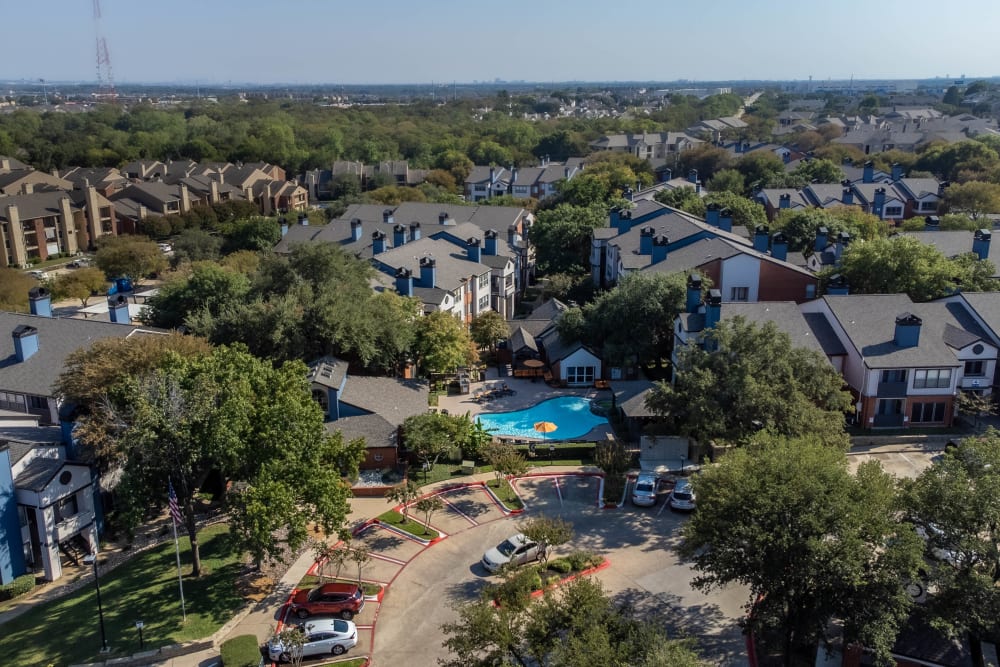 Our Modern Apartments in Lewisville, Texas showcase aerial view of swimming pool