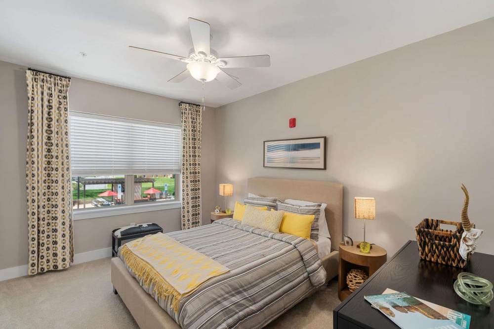 Modren bedroom with a large window at East of Market in Frederick, Maryland