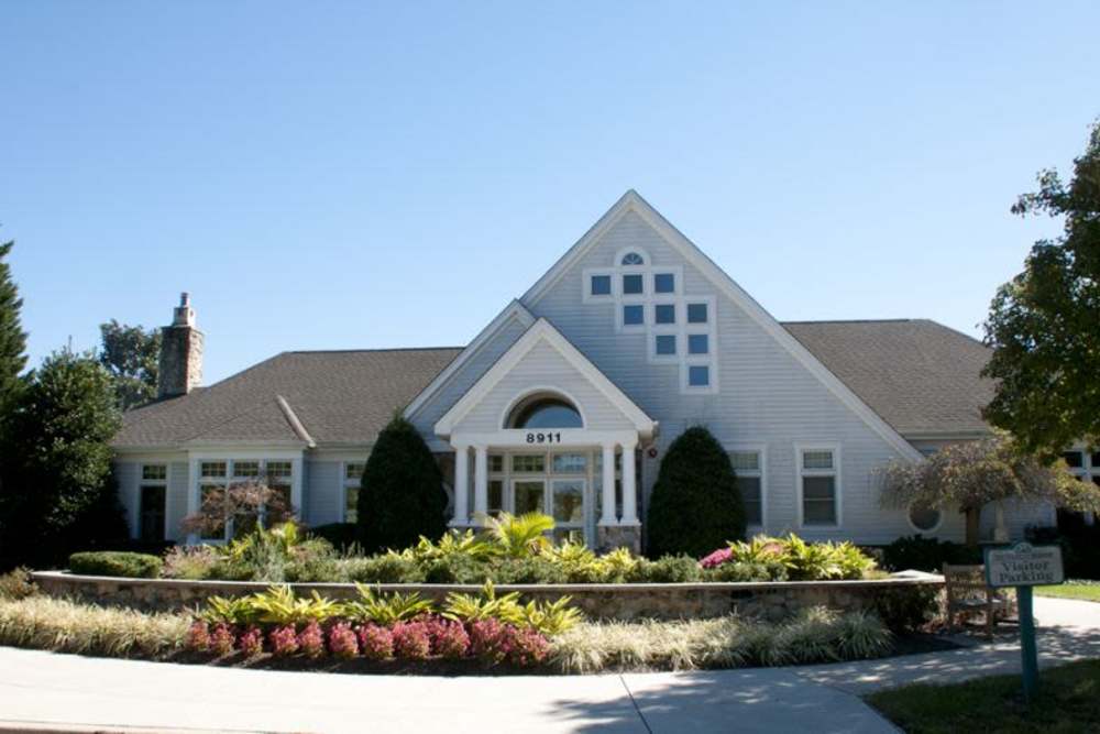 Front entrance to the building at WOODS OF MARLTON in Upper Marlboro, Maryland