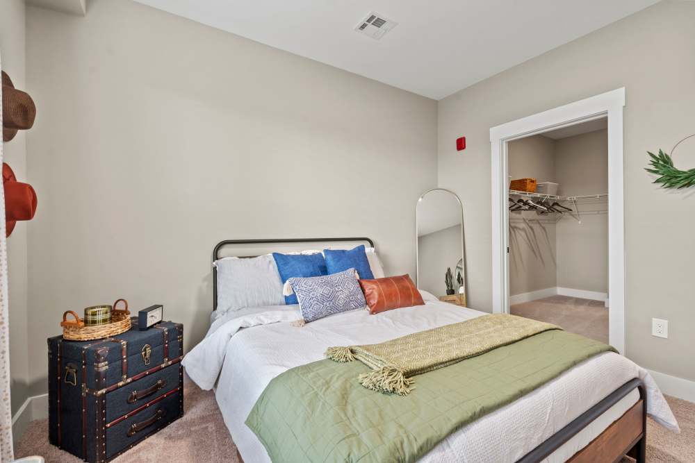 Bedroom with a bedside table at Upper East in Frederick, Maryland