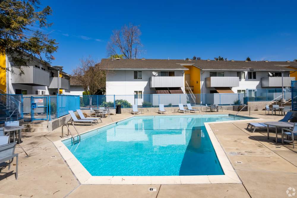 Swimming pool with pool-side seating Lakeside Village in San Leandro, California
