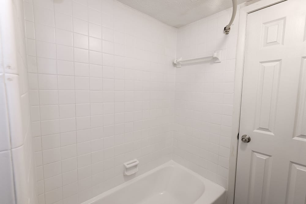 A full-sized bathtub in an apartment bathroom at LaVista Crossing in Tucker, Georgia