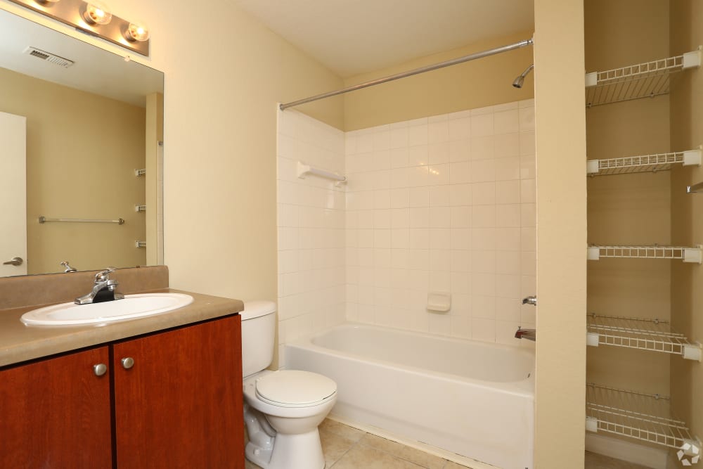 Bathroom with bathtub at Palmetto Ridge in Titusville, Florida