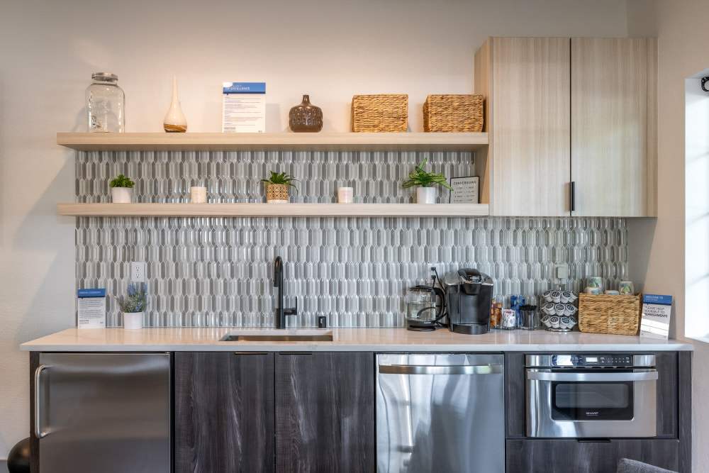 Clubhouse kitchen with custom backsplash at 1202 Pearl in Tacoma, Washington