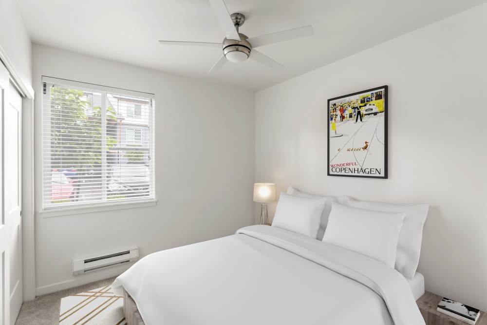 Bedroom with a ceiling fan at 207 East in Edgewood, Washington