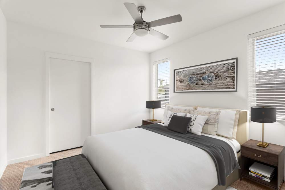Bedroom with ceiling fan at Helm in Everett, Washington