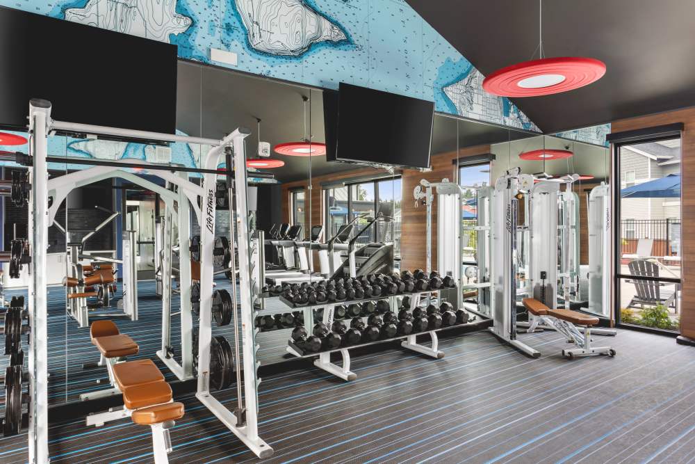 Fitness center with lots of machines at Helm in Everett, Washington