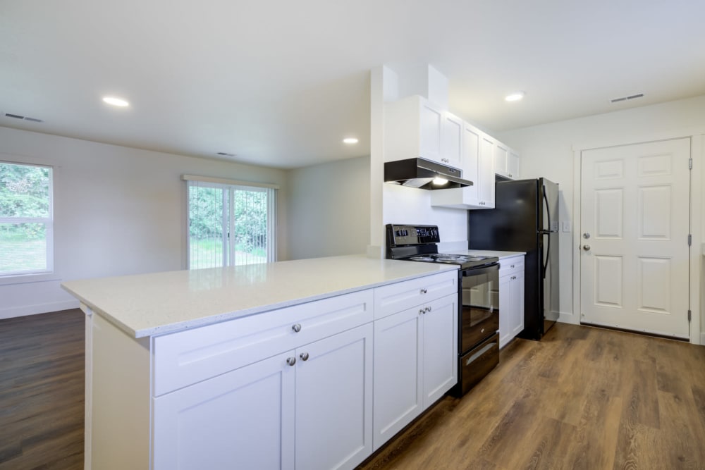 Upgraded kitchen with island bar at Davis Hill in Joint Base Lewis McChord, Washington