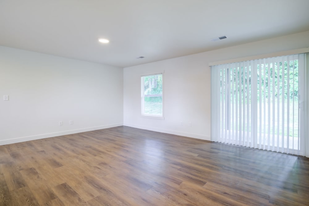 Expansive living room with backdoor access at Davis Hill in Joint Base Lewis McChord, Washington