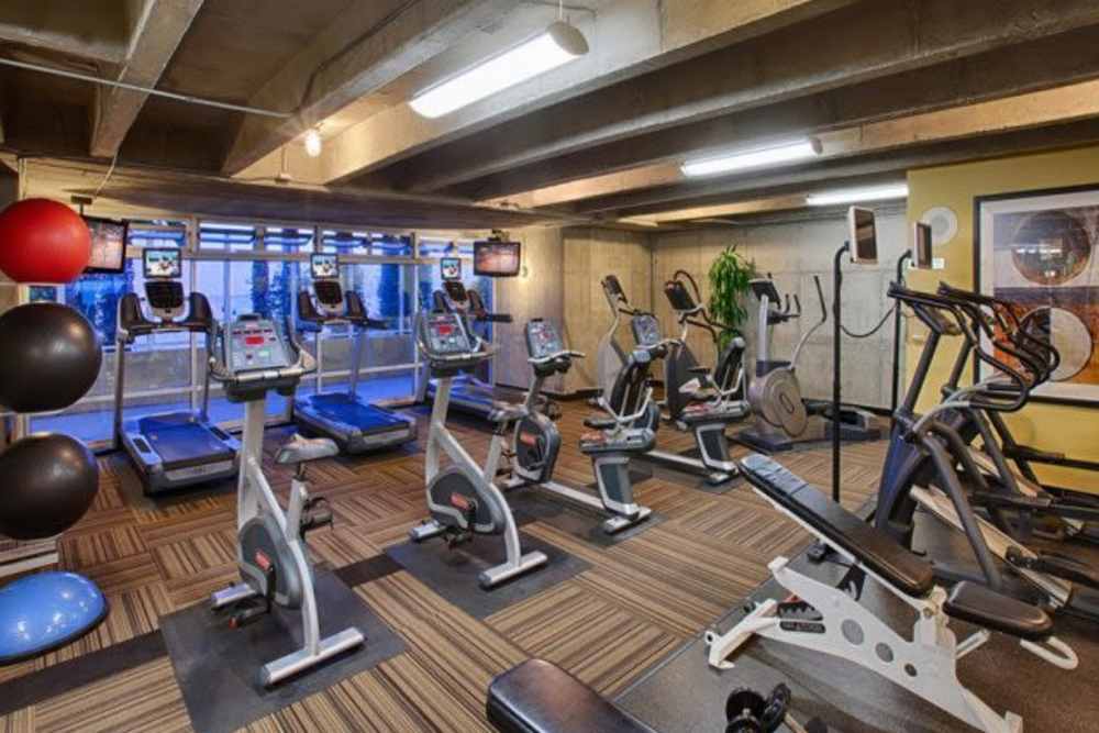 Spacious fitness center at 1900 Ocean Apartment Homes in Long Beach,California