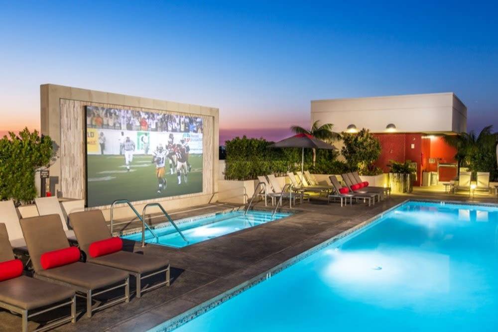 Resort-style swimming pool at The Marke Apartment Homes in Santa Ana, California
