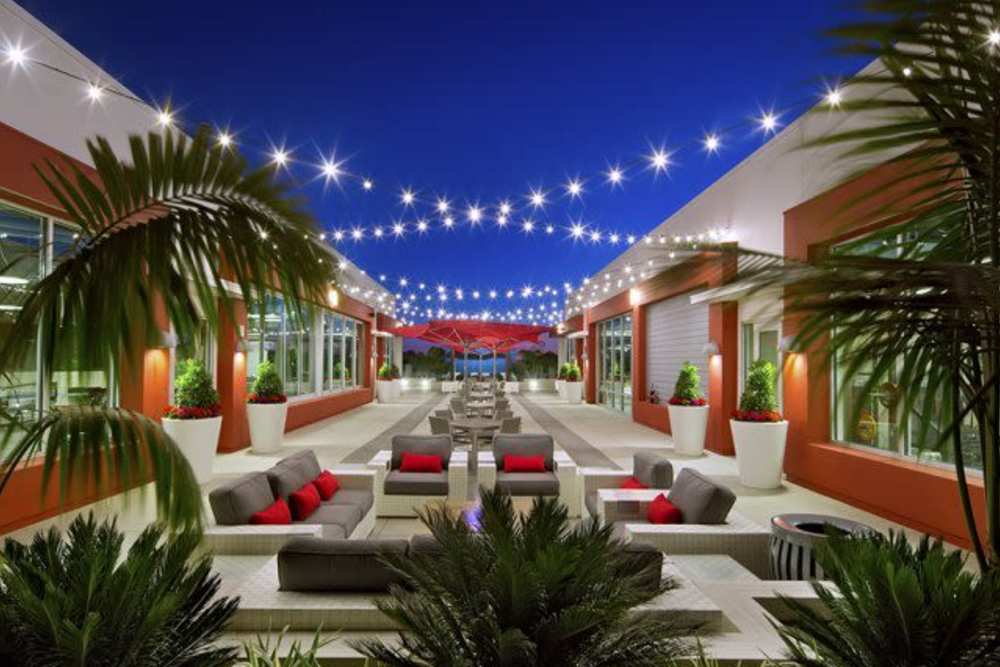 Outdoor seating and picnic area at The Marke Apartment Homes in Santa Ana, California