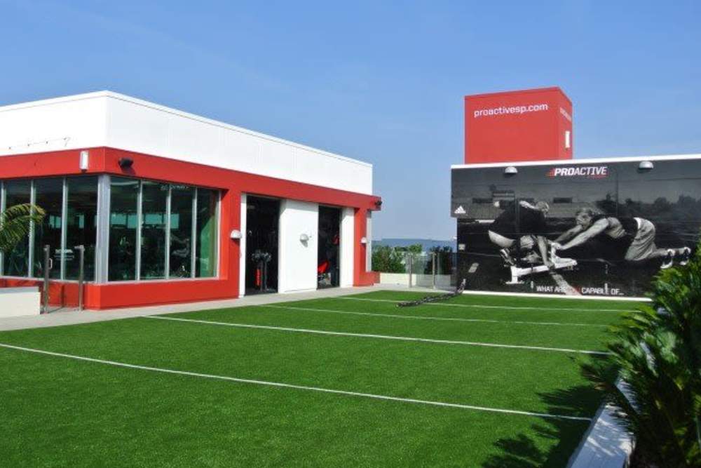 Sports performance training facility with turf at The Marke Apartment Homes in Santa Ana, California