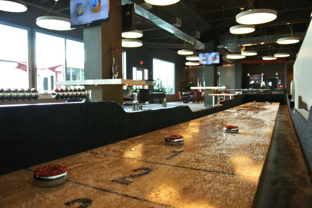 Shuffleboard table at The Marke Apartment Homes in Santa Ana, California