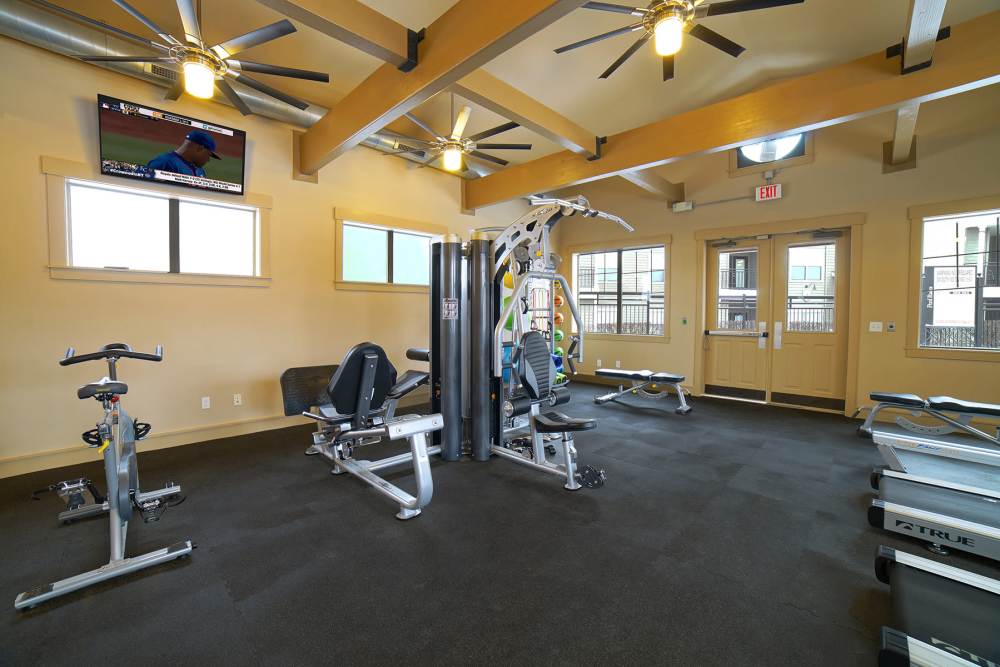 Resident fitness center with weights at The Quarters at Lawrence in Lawrence, Kansas