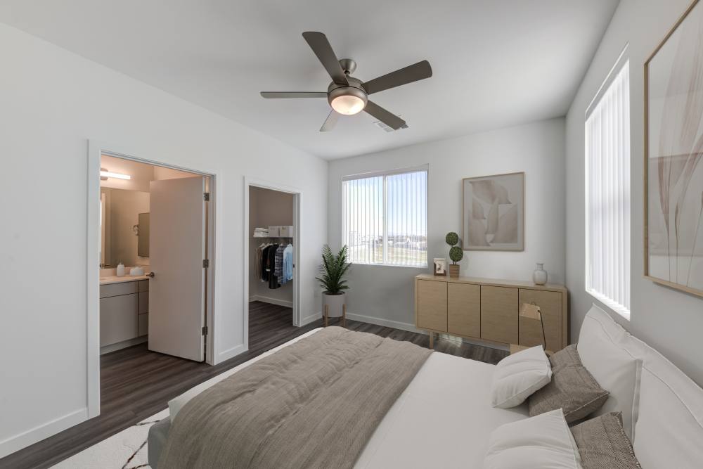 Bedroom with a ceiling fan in a apartment at Salt River Flats in Phoenix, Arizona 