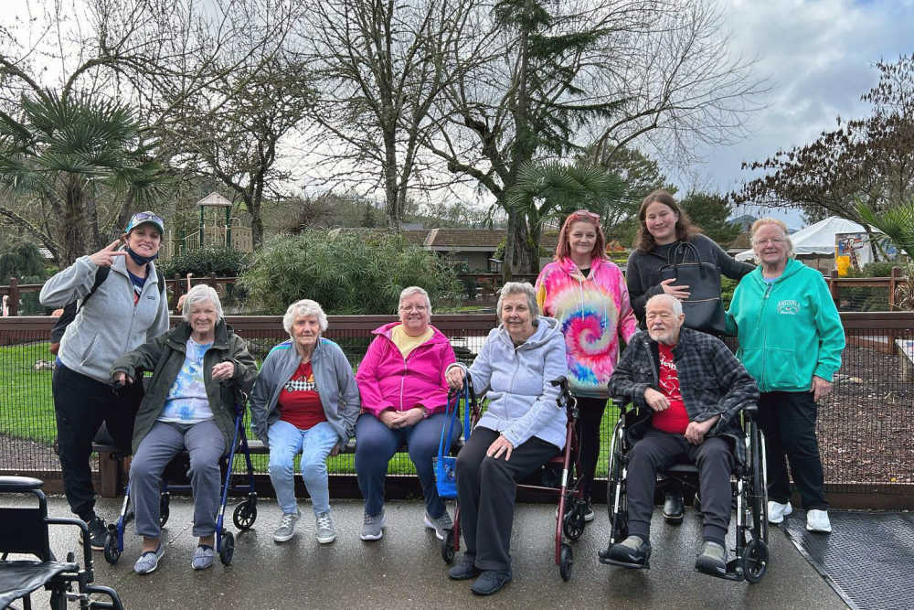 Smiling residents at Evergreen Memory Care in Eugene, Oregon. 