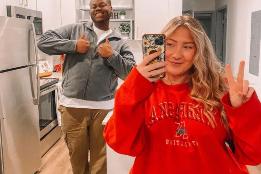 Residents posing in apartment at LivRed in Lincoln, Nebraska