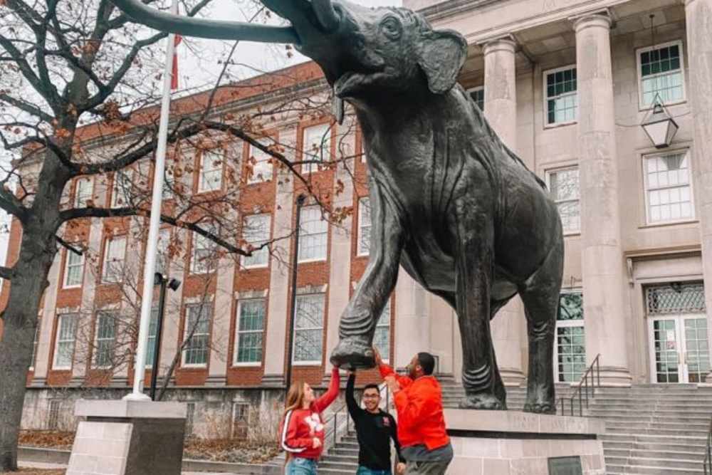 Residents posing with elephant statue outside at LivRed in Lincoln, Nebraska