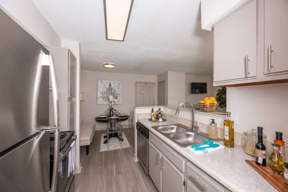 Stainless-steel appliances in a kitchen at Park On Sweetwater Apartment Homes in Lawrenceville, Georgia