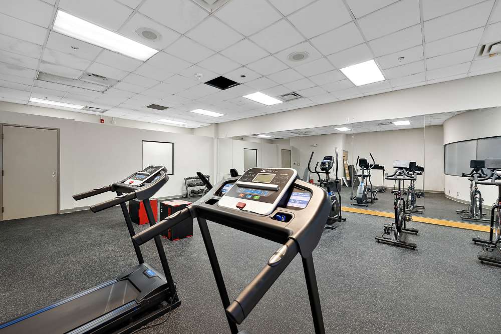 Fully-equipped gym with treadmills and more at The Block at Sterling Heights in Sterling Heights, Michigan