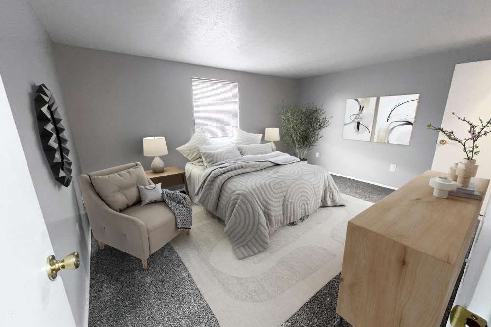 Bedroom with a comfortable bed at North Eden Townhomes in Columbus, Ohio