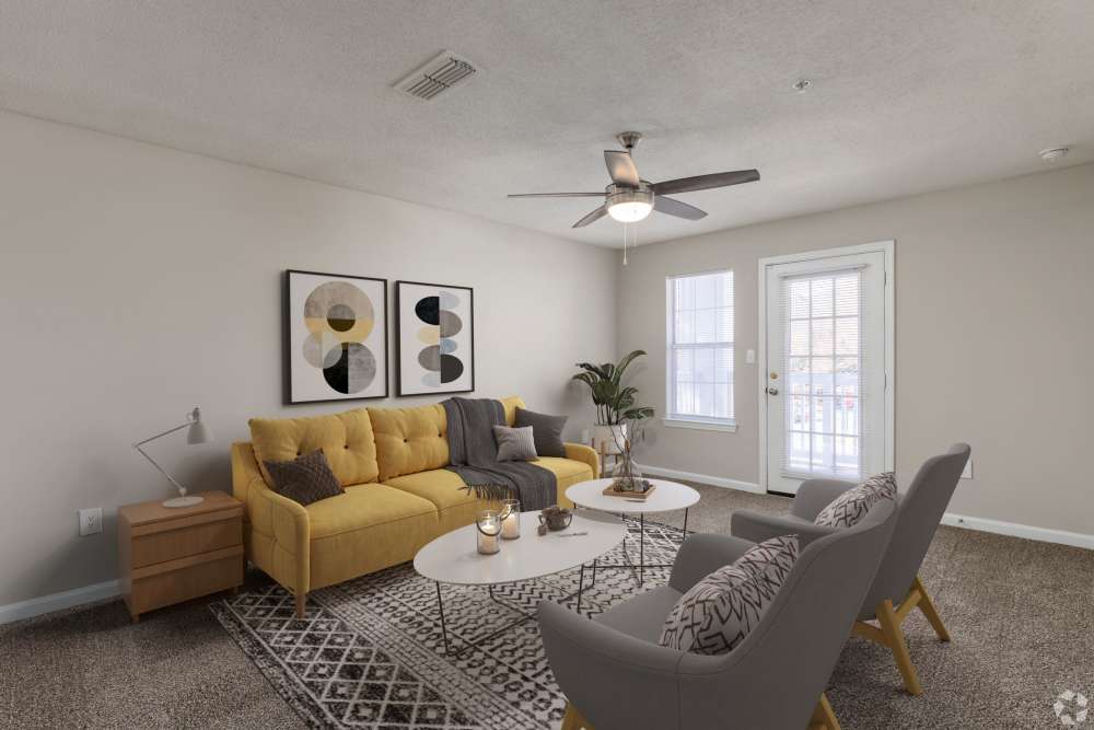 Living room with couches and coffee table at Cherokee Summit Apartments in Acworth, Georgia