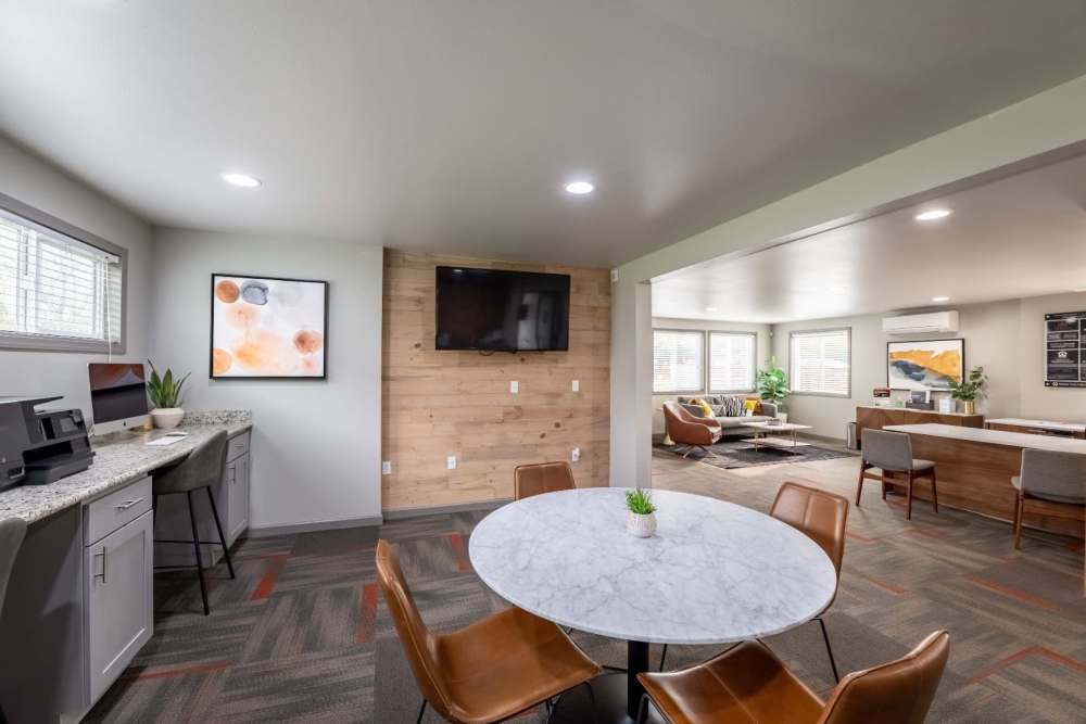 Clubhouse/leasing office with TV at Terra Apartment Homes in Federal Way, Washington