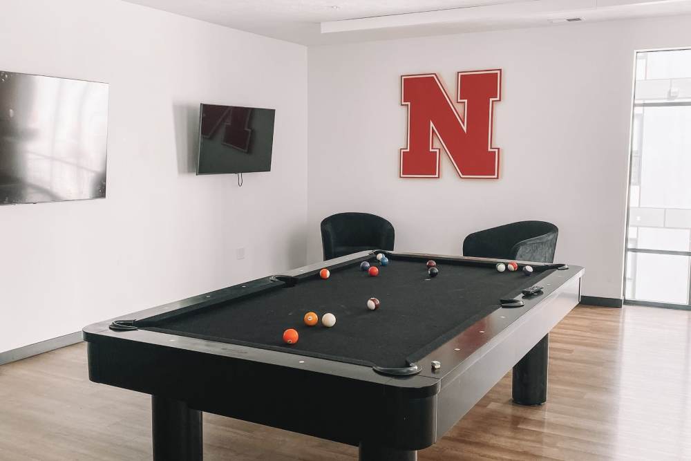 Recreation room with billiards at LivRed in Lincoln, Nebraska