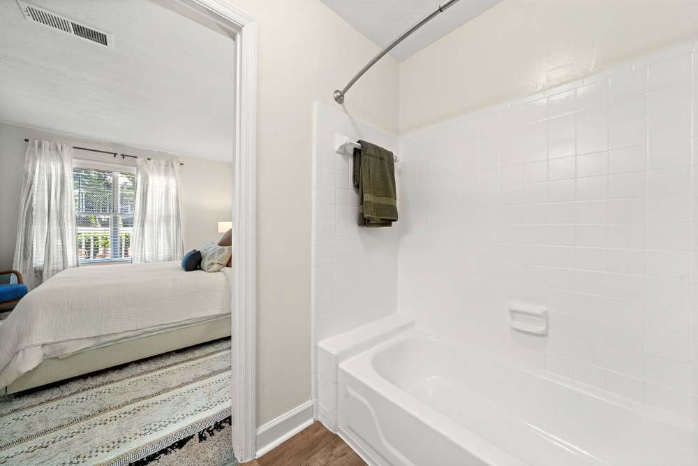 Bathroom with tub at The Laurel Apartments in Spartanburg, South Carolina