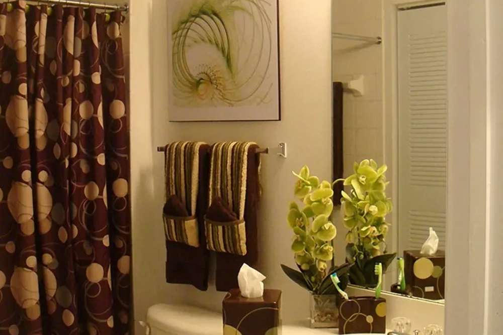 A decorated apartment bathroom at Bernwood Trace in Fort Myers, Florida