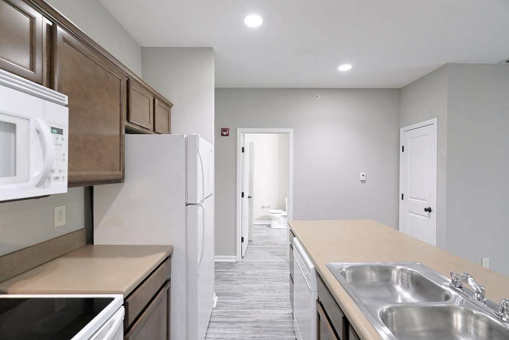 Apartment kitchen at Aspire at Bristol Park in Grain Valley, Missouri