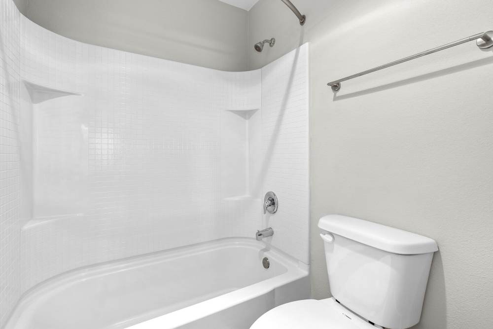 Modern bathrooms with showers at Terre at Sandalwood in El Cajon, California