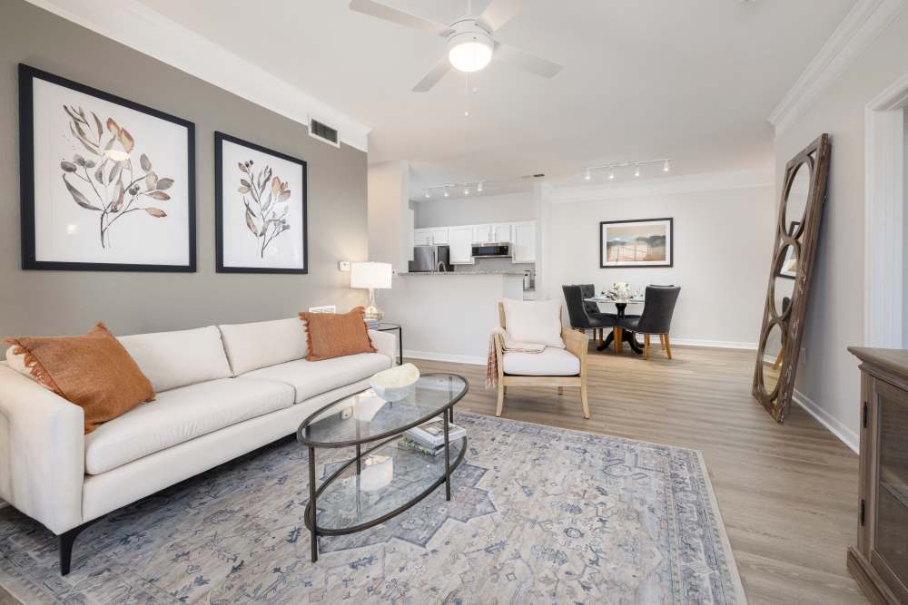 Wood flooring in a furnished model apartment living room at Arbors at Cahaba River in Birmingham, Alabama