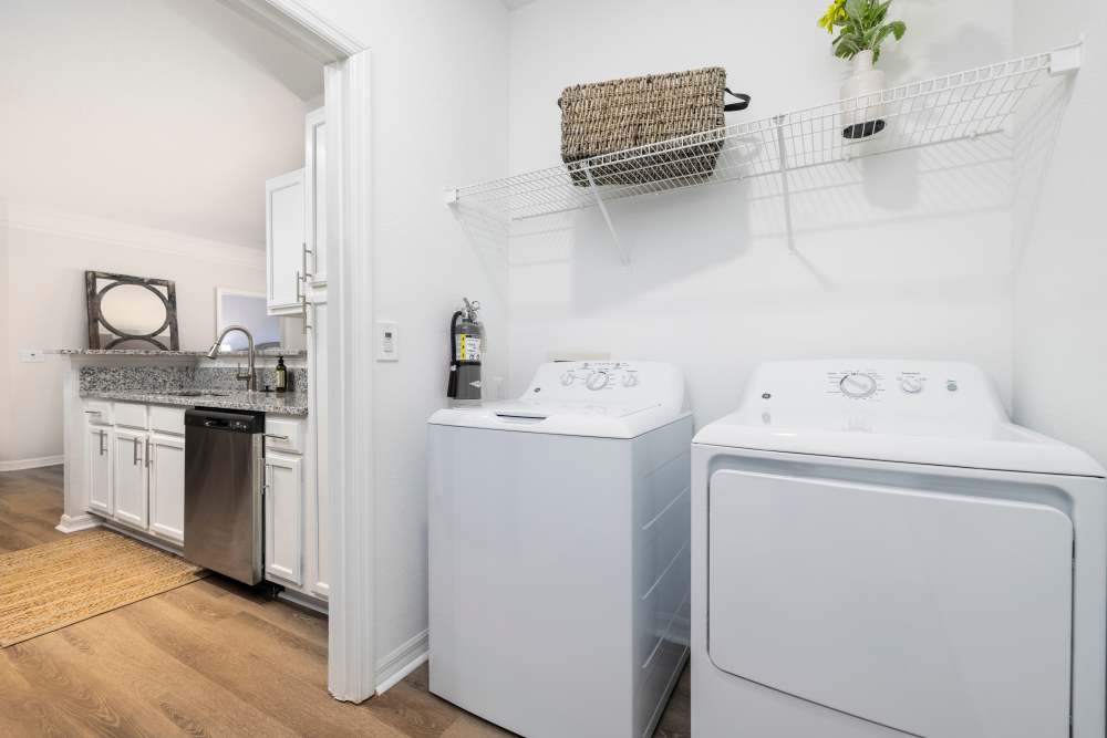 A full-sized washer and dryer in an apartment at Arbors at Cahaba River in Birmingham, Alabama