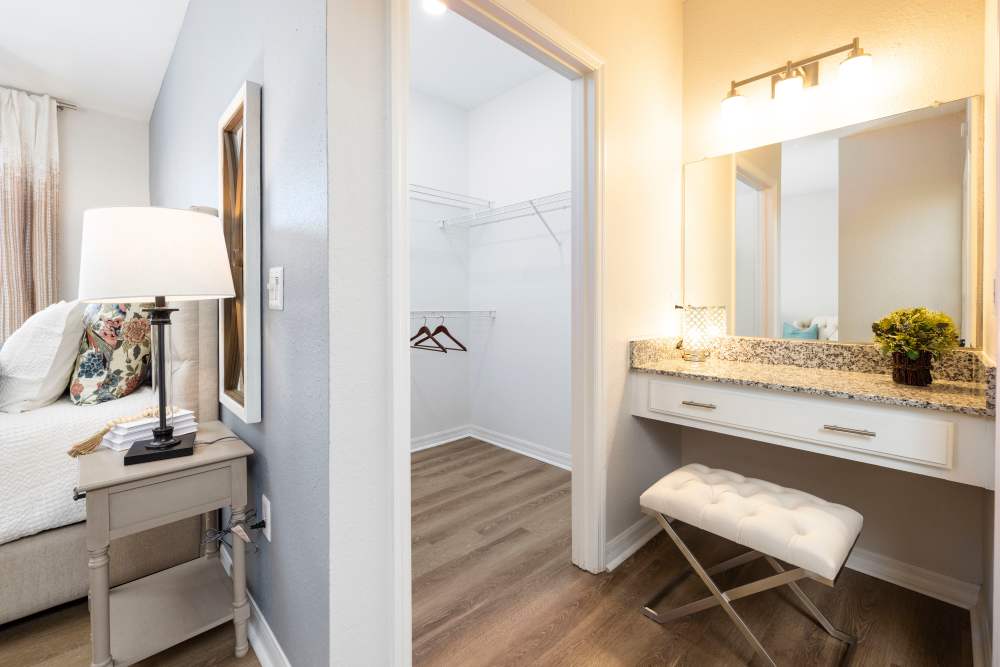 A vanity in a large model bedroom at Arbors at Cahaba River in Birmingham, Alabama