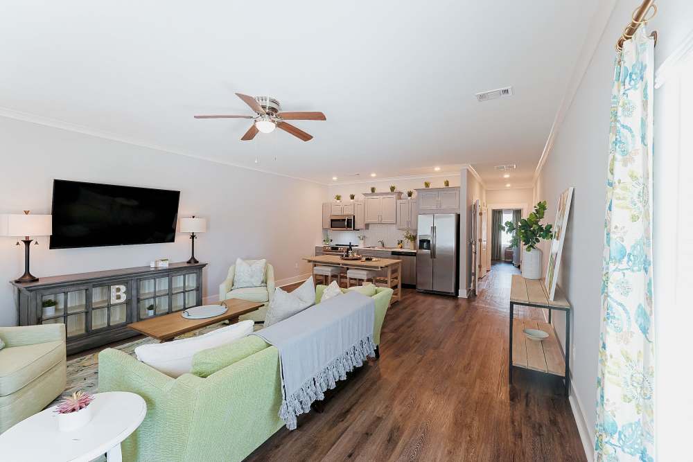 Living room and kitchen in a model home at Beverly Villas in Brunswick, Georgia