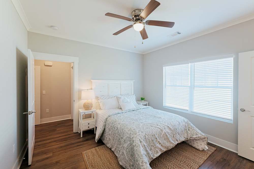 A bedroom in a model home at Beverly Villas in Brunswick, Georgia